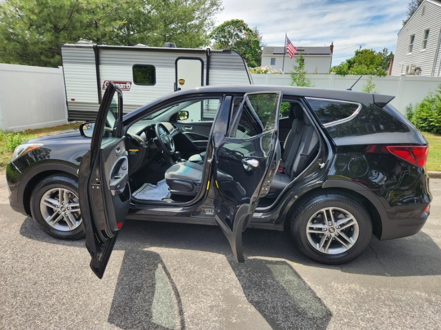 hyundai santa fe 2018 5NMZTDLB2JH099120 image hyundai santa fe 2018 5NMZTDLB2JH099120 image